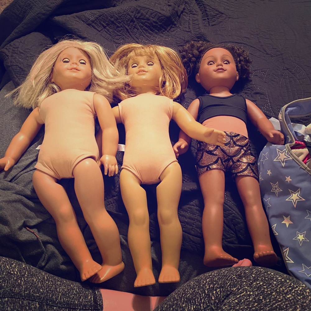 2 American girl dolls and one from target
